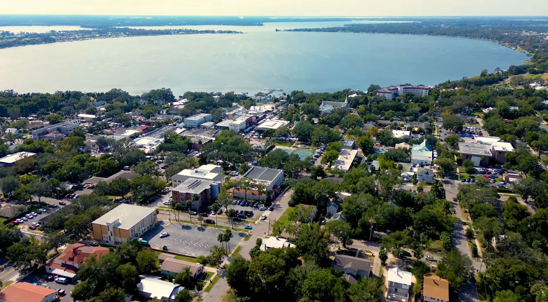 [Collage of listings, lifestyle, and community moments]